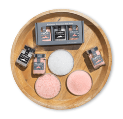 Natierra Gourmet Salt Trio Box, Natierra Gourmet Salt Trio jars with salt in tin top on round wood top