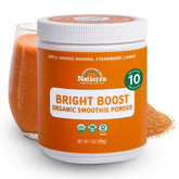 Natierra Bright Boost Organic Smoothie jar with glass and powder in the background