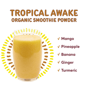 Natierra Organic Tropical Awake Smoothie in glass next to list of ingredients